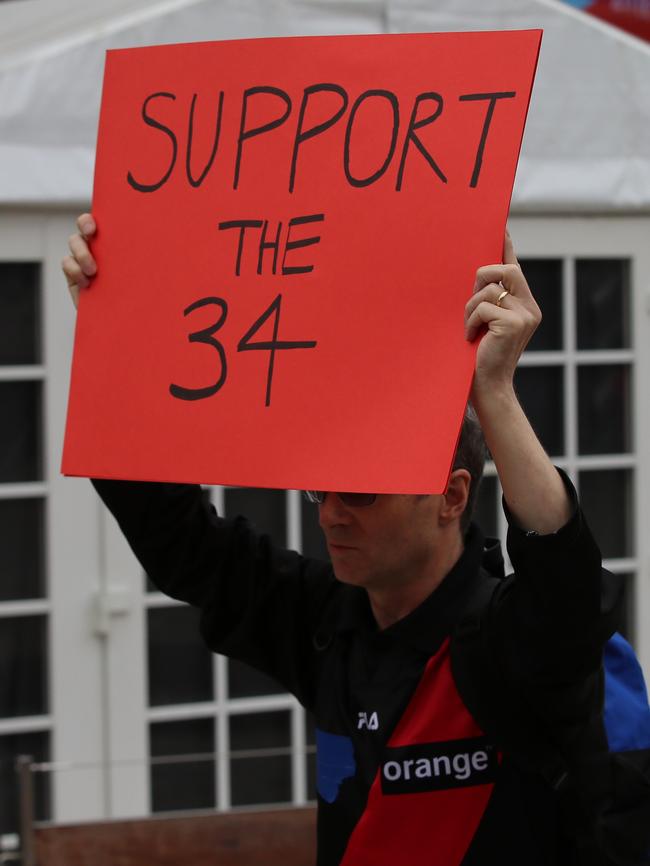 Essendon fans descend continued to support the players. Picture: Alex Coppel