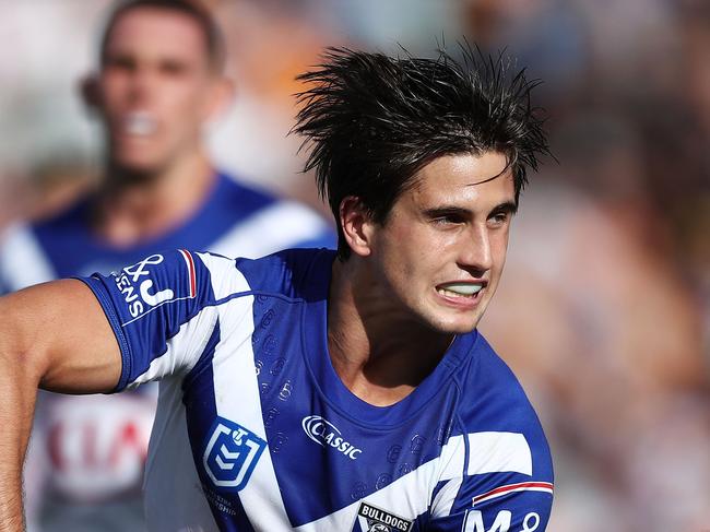 SYDNEY, AUSTRALIA - MARCH 31: Lachlan Lewis of the Bulldogs passes during the round three NRL match between the Wests Tigers and the Canterbury Bulldogs at Campbelltown Stadium on March 31, 2019 in Sydney, Australia. (Photo by Matt King/Getty Images)