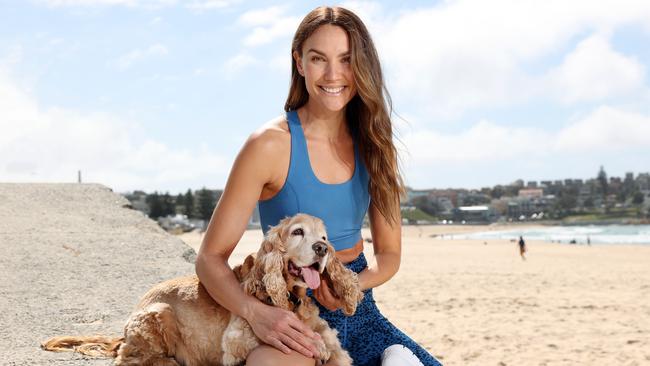 Rachael Finch with her dog Simba at Bondi Beach. Picture: Richard Dobson