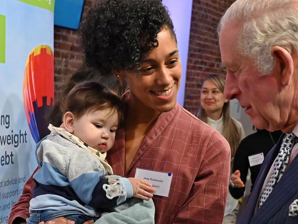 King Charles III meets Jess Rodewald, holding 7-month-old baby Matthew, during a visit to King's House, a community hub founded by King's Cross Church (KXC), on Thursday. Picture: Justin Tallis - WPA Pool/Getty Images