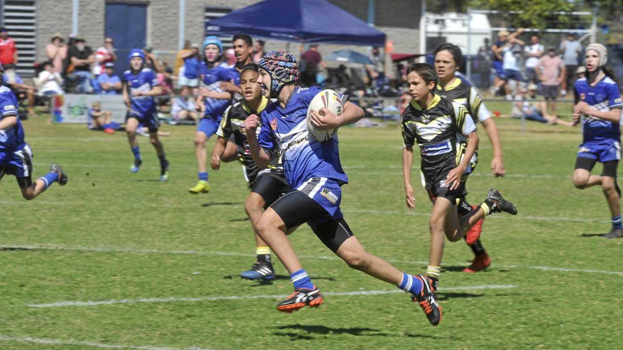 Lockie McLaughlin scores in the under-13 Group 1 grand final between the Grafton Ghosts and the Clarence Coast Magpies at Frank McGuren Field on Saturday. Picture: Mitchell Keenan