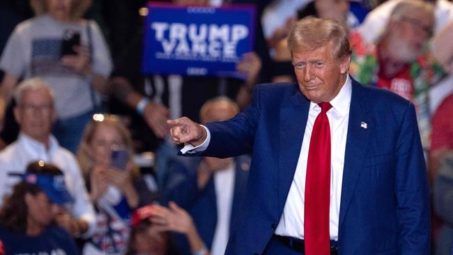 Donald Trump acknowledges the crowd in Uniondale, New York. Picture: AFP