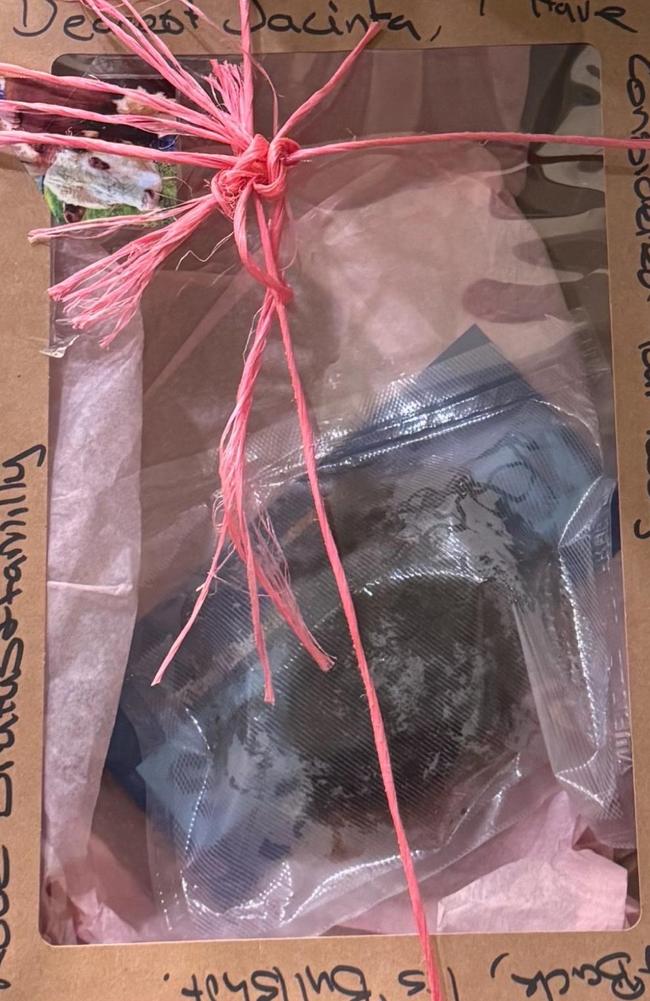 The pretty parcel of cow manure left at Ms Allan’s office. Picture: Supplied