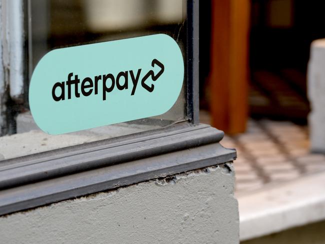 MELBOURNE, AUSTRALIA - NewsWire Photos APRIL 30, 2021: Stock Image of Afterpay logo in a shop window on Little Collins Street, Melbourne. Picture: NCA NewsWire / Andrew Henshaw