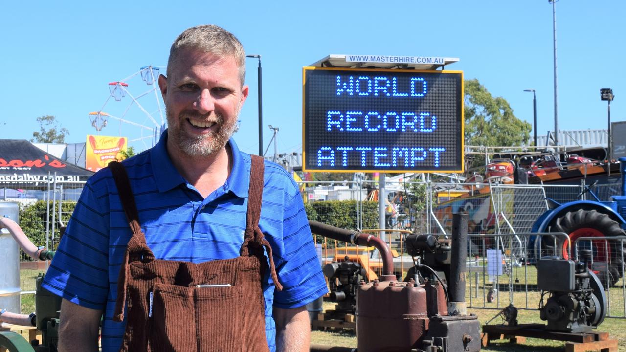 World record marketing co-ordinator Craig Tunley dons his overalls in preparation for the 'most overalls worn at once' world record attempt at the Dalby Show 2023. Picture: Emily Devon