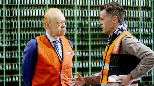 Visy executive chairman Anthony Pratt speaks with NSW Premier Chris Minns at a factory in Penrith. Picture: John Appleyard/NewsWire