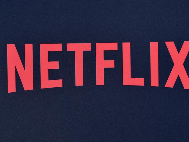 (FILES) In this file photo taken on June 28, 2019 the Netflix logo is seen on the backdrop of Netflix's "Stranger Things 3" premiere at Santa Monica high school Barnum Hall in Santa Monica, California. - Netflix shares dived on July 16, 2020 after the leading streaming entertainment service reported relatively flat quarterly profits despite rising subscriber numbers. (Photo by Chris Delmas / AFP)