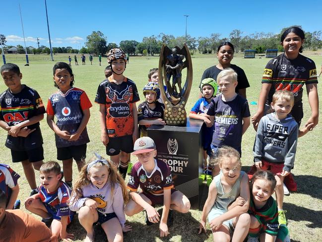 Youngsters swarmed about the famous NRL Provan-Summons Trophy, which was on show at the Redbank Plains fields.