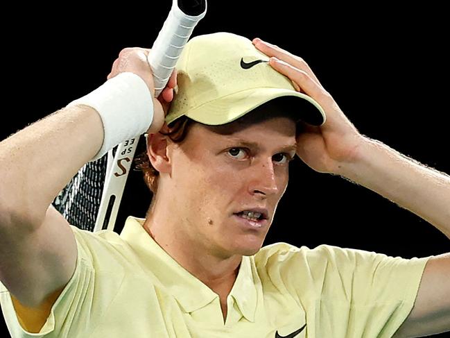 Italy's Jannik Sinner celebrates the match point against Germany's Alexander Zverev during their men's singles final match on day fifteen of the Australian Open tennis tournament in Melbourne on January 26, 2025. (Photo by Martin KEEP / AFP) / -- IMAGE RESTRICTED TO EDITORIAL USE - STRICTLY NO COMMERCIAL USE --