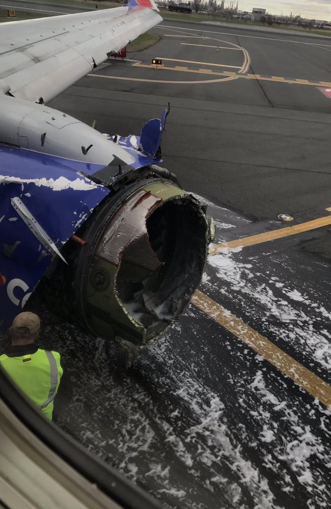The engine on Southwest Airlines Flight 1380 is seen after the Boeing 737 made an emergency landing at Philadelphia International Airport on April 17, 2018.