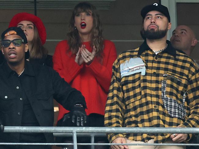 Cara Delevingne with close friend Taylor Swift at a Kansas City Chiefs game in January. Picture: Getty Images