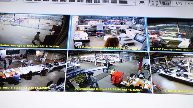 A television monitor streams video of the ballot counting process at the Allegheny County elections warehouse in Pittsburgh, Pennsylvania. Picture: AFP.