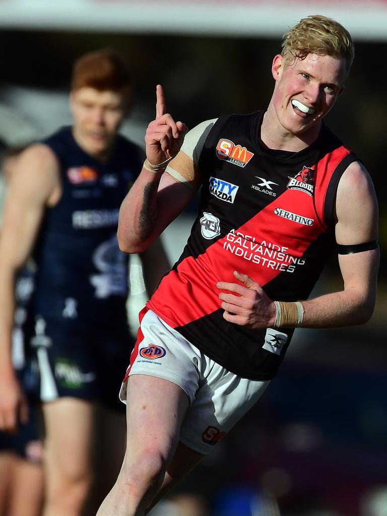 John Noble kicks a goal in the SANFL.