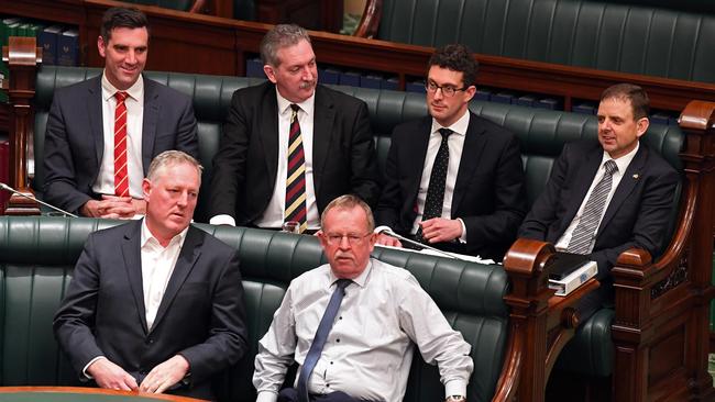 MPs Fraser Ellis, Steve Murray, Dan Cregan and Nick McBride crossed the floor — they are seated behind independent MPs Troy Bell and Geoff Brock. Picture: Tom Huntley