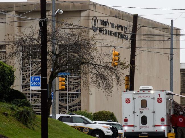 PITTSBURGH, PA - OCTOBER 27: The scene of a mass hooting at the Tree of Life Synagogue in the Squirrel Hill neighborhood on October 27, 2018 in Pittsburgh, Pennsylvania. According to reports, at least 12 people were shot, 4 dead and three police officers hurt during the incident. According to reports, at least 12 people were shot, 4 dead and three police officers hurt during the incident. The shooter surrendered to authorities and was taken into custody.   Jeff Swensen/Getty Images/AFP == FOR NEWSPAPERS, INTERNET, TELCOS & TELEVISION USE ONLY ==