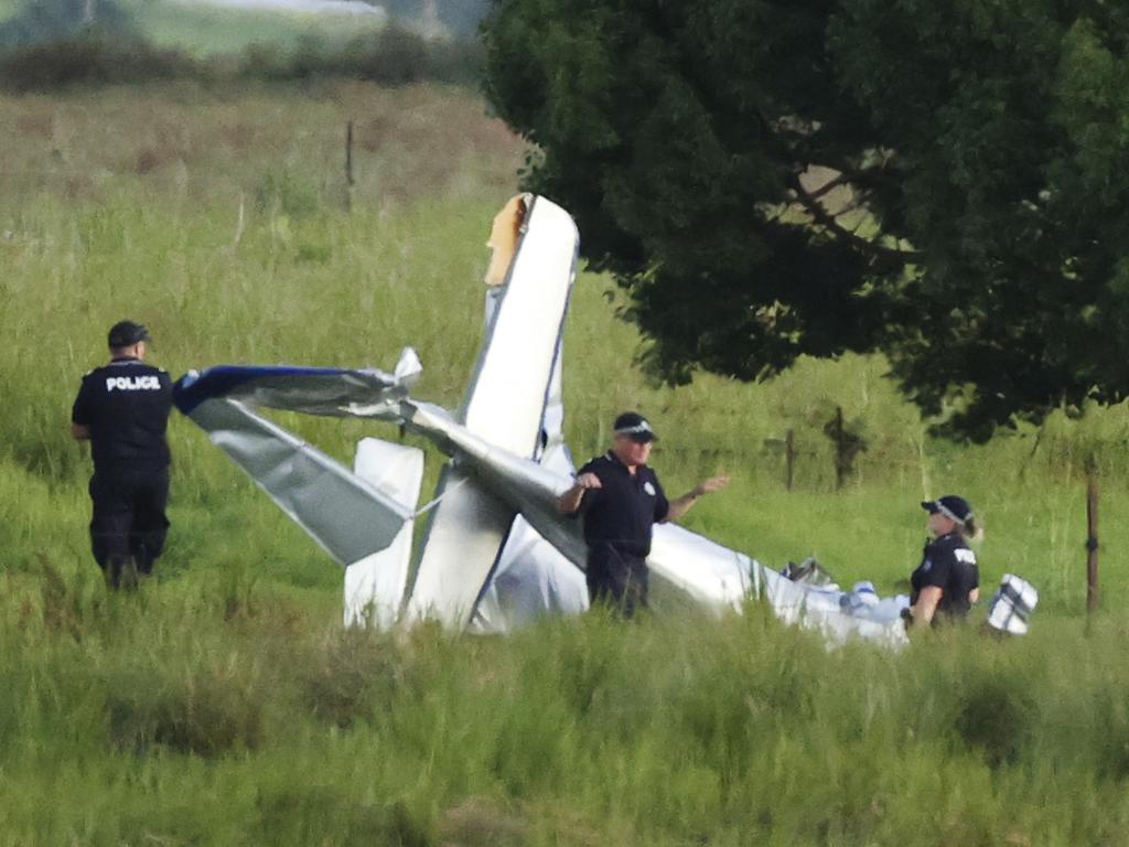 Police at the scene of the crash. Picture: Lachie Millard