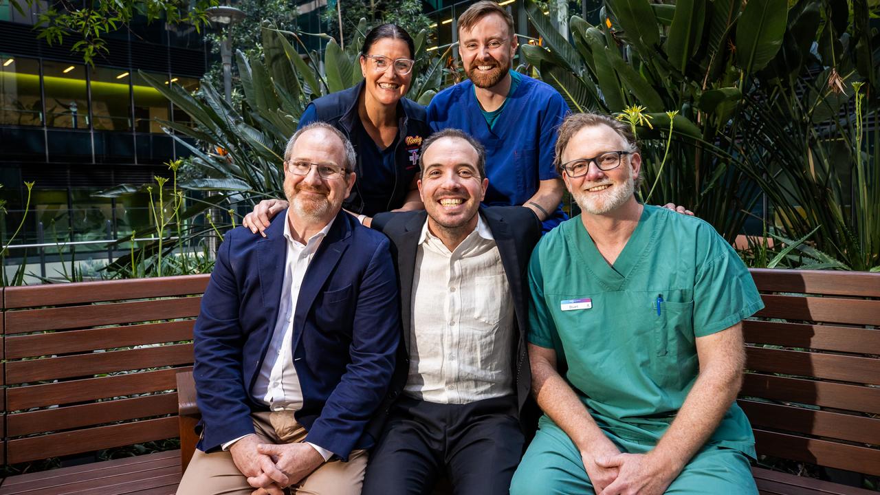 Ben Hyde with RAH ICU nurse Rochelle 'Rocky' Smith, RAH Burns Unit senior surgeon Dr Patrick Coghlan (back) and head of Burns Unit Marcus Wagstaff and Burns Unit nurse practitioner Stuart Harper. Picture: Tom Huntley