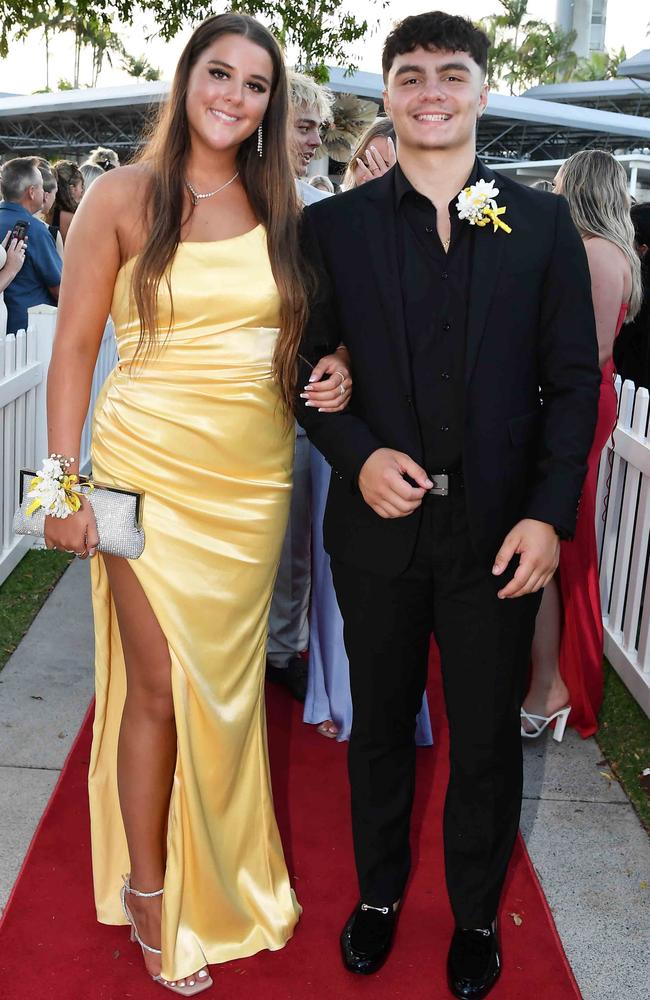 Yellow dresses offered pops of colour on the red carpet this year. Jasmine Fry and Zak Zibara at the Caloundra State High School formal. Picture: Patrick Woods.