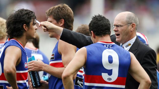 Rodney Eade with Jordan McMahon and Lindsay Gilbee, the player that would eventually keep McMahon out of the team.