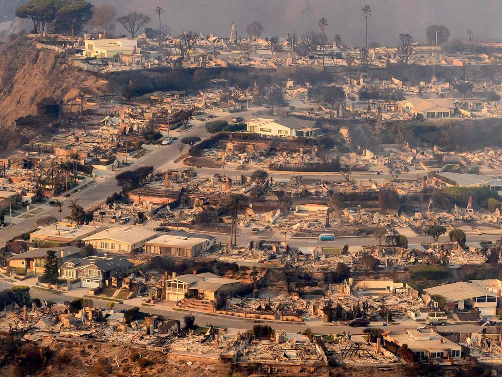 Massive wildfires that engulfed whole neighborhoods and displaced thousands in Los Angeles remain totally uncontained. Picture: JOSH EDELSON / AFP