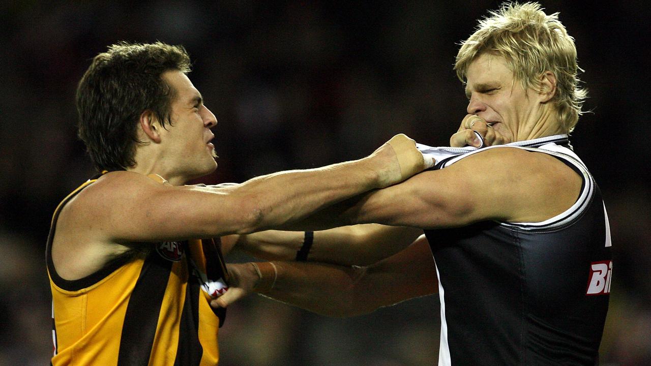 Luke Hodge gets stuck into Nick Riewoldt.