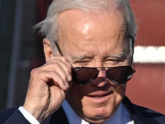 US President Joe Biden disembarkes from Air Force One, upon his arrial at Vilnius International Airport in Lithuania on July 10, 2023 for the NATO summit. (Photo by ANDREW CABALLERO-REYNOLDS / AFP) / ALTERNATE CROP