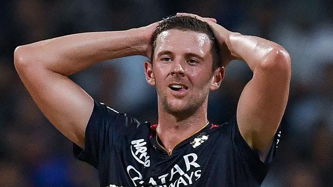 Josh Hazlewood was picked up by Royal Challengers Bengaluru for A$2.29 million. (Photo by INDRANIL MUKHERJEE / AFP)