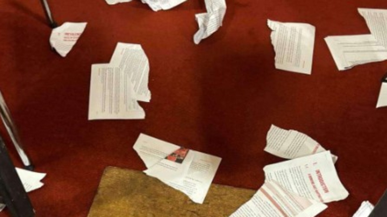 Pieces of the Red Zone report torn up during the student council meeting. Picture: Supplied