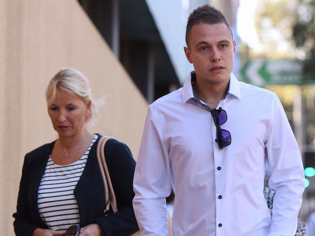 Tim Lauschet (right), the son of MH17 victim Gabriele Lauschet at the Glebe Coroners Court in Sydney, Tuesday, May 17, 2016. The NSW State Coroner is holding an inquest into the deaths of six New South Wales residents that died in the MH17 Malaysia Airlines disaster on July 17, 2014. (AAP Image/Dean Lewins) NO ARCHIVING