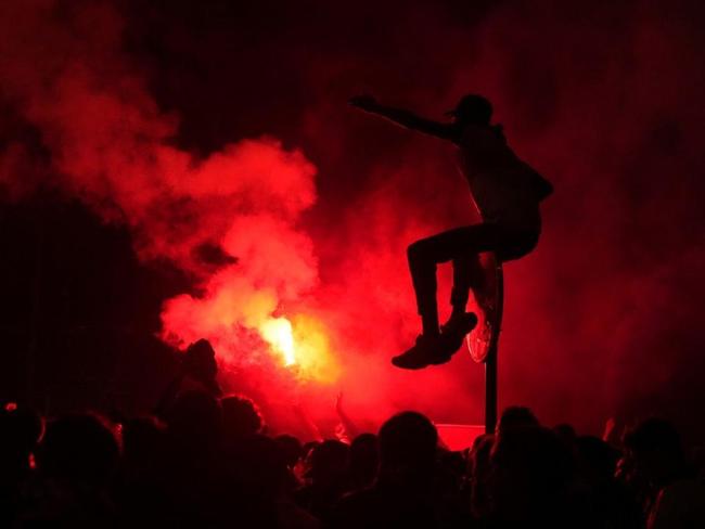 Hundreds arrested and two people killed in violent celebrations in France