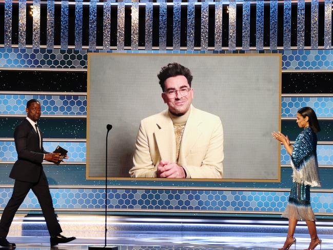 Dan Levy accepts the Golden Globe for Best Musical/Comedy Series. Picture: Getty Images