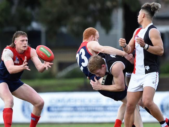 Gotcha: City’s Nick Perry brings down Bentleigh’s Kayen O’Brien.