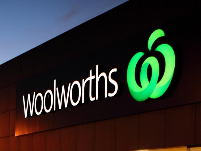 Mount Gambier, South Australia, Australia - June 6, 2015: Woolworths Store at Commercial Road East Mt Gambier. Customers arrive at the Store to Shop in the Early Evening. Woolworths is the Largest Australian Owned and Operated Supermarket/Grocery Chain in Australia, with over 933 stores throughout Australia.