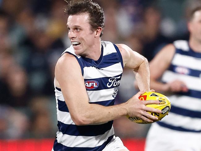 ADELAIDE, AUSTRALIA - APRIL 06: Max Holmes of the Cats in action during the 2024 AFL Round 04 match between the Western Bulldogs and the Geelong Cats at Adelaide Oval on April 06, 2024 in Adelaide, Australia. (Photo by Michael Willson/AFL Photos via Getty Images)