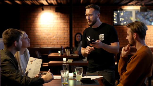 Patrons at Morningside Tavern in Auckland, New Zealand. Picture: Getty Images