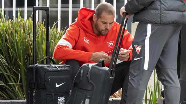 Franklin waits for transport after arriving in Melbourne ahead of their game with North Melbourne on Sunday. Picture: Tony Gough