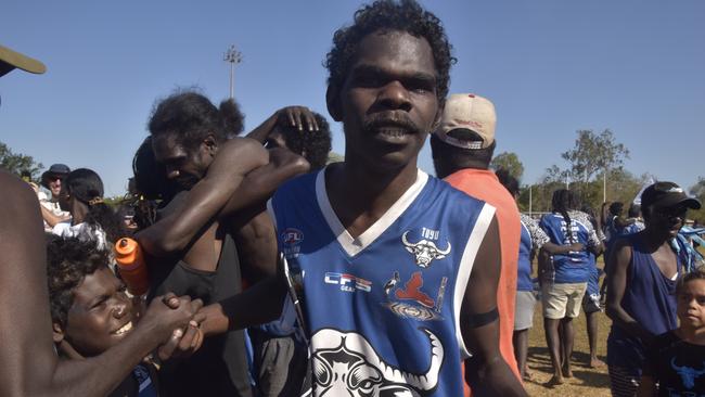 The Buffaloes celebrating in the Tiwi Island Football League grand final between Tuyu Buffaloes and Pumarali Thunder. Picture: Max Hatzoglou