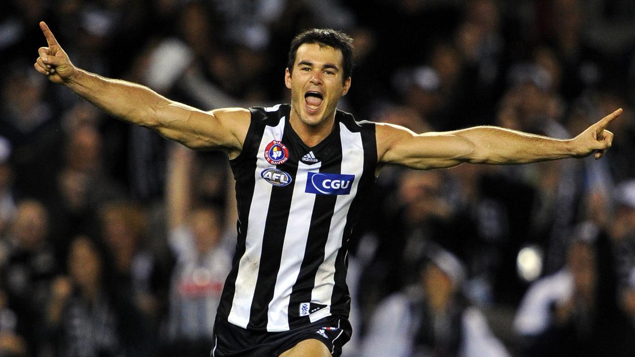 Chris Tarrant celebrates one of his final-quarter goals against the Crows in 2011.