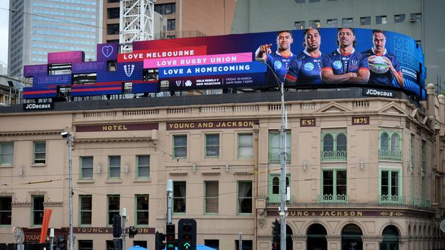 Billboard on top of Young and Jackson's Hotel in Melbourne featuring Melbourne Rebels players Jordan Uelese, Pone Fa'amausili, Rob Leota and Trevor Hosea. Picture: NCA NewsWire / Andrew Henshaw