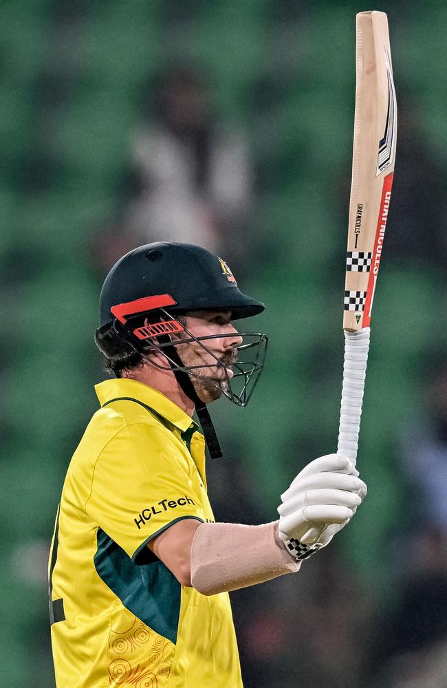 Travis Head celebrates his half century before play was abandoned. Picture: Aamir QURESHI / AFP