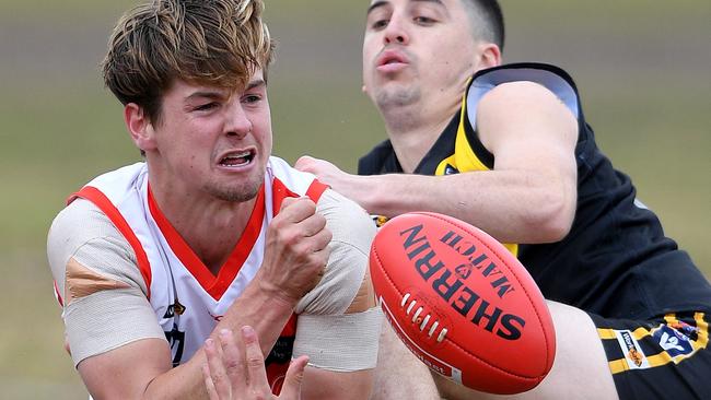 Chad Harris and Samuel Lonie in action during the MPNFL Division 1 football match between Seaford and Sorrento in Seaford, Saturday, Aug. 4, 2018. Picture: Andy Brownbill