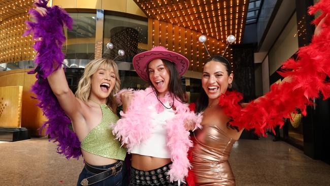 Taylor Swift fans Sarsha Marsden, Claudia Ralph and Hannah Duke hoping to get their hands on tickets that Crown are giving away to her sold out Melbourne shows. Picture: David Caird