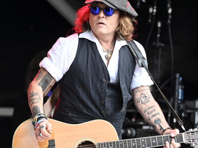 Johnny Depp performs on stage with Jeff Beck during the Helsinki Blues Festival in Helsinki. Picture: AFP