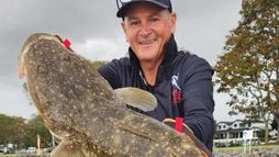 Fisherman Ryan Parsons, 50, caught an 82cm flathead in Tweed on November 26, 2023. Picture: Supplied.