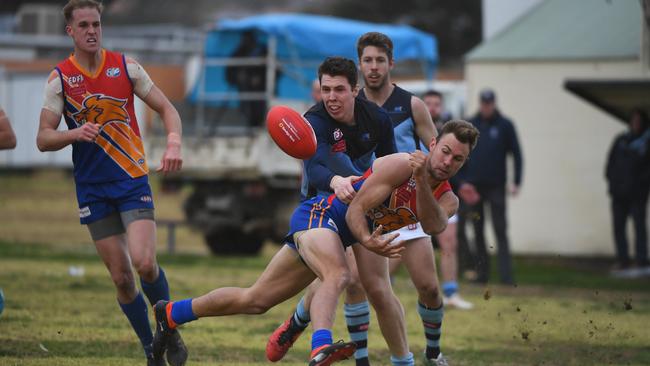 Josh Pickess fires off a handball for Maribyrnong Park. Picture: James Ross