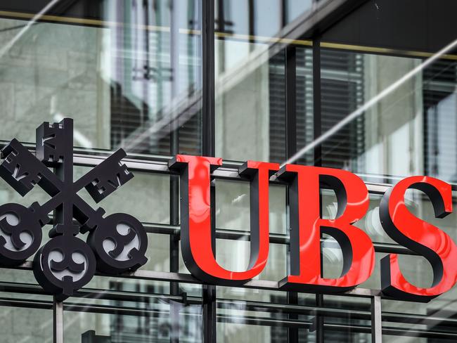 (FILES) In this file photo taken on October 26, 2018 a sign of Swiss banking giant UBS is seen at a branch in Zurich. - After a six-year investigation, judges last year charged the bank and its French subsidiary of laundering proceeds from tax fraud carried out from 2004 to 2012, allegations the bank has denied. Paris courthouse will rule on the case fo the Swiss giant bank UBS on the afternoon of February 20, 2019. (Photo by Fabrice COFFRINI / AFP)