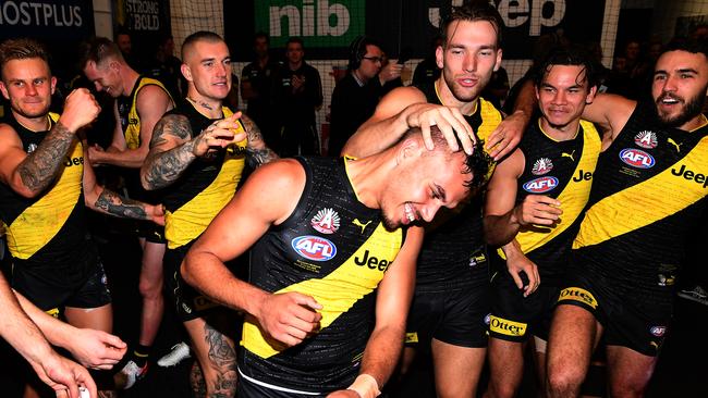 Sydney Stack celebrates his first win as a Richmond player. Picture: AAP Image/Julian Smith.