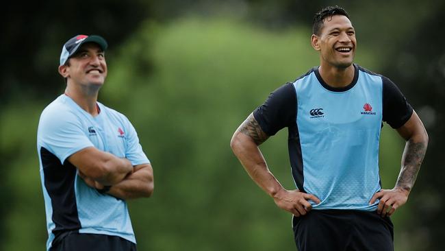 Coach Daryl Gibson says the Waratahs’ Wallabies are feeling the heat from the club’s rookies.