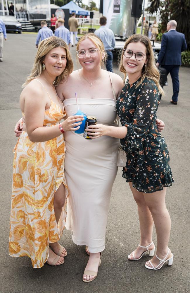 At 2023 Audi Centre Toowoomba Weetwood race day are (from left) Tayla Lord, Montana Wilkins and Gabby Trost. Picture: Kevin Farmer