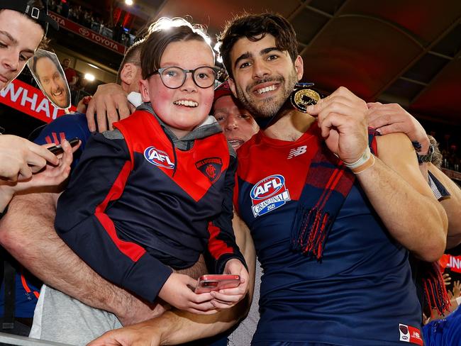 Lucas Peters with Christian Petracca after the Demons’ AFL grand final win. Picture: Getty